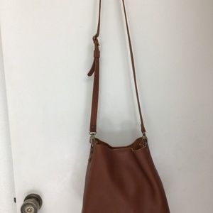 Portland Leather crossbody butterfly bucket bag